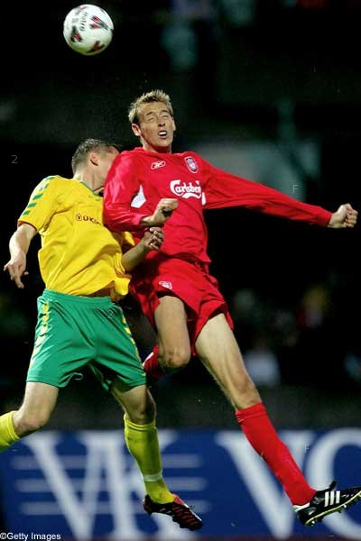 Peter Crouch climbs for a header.jpg