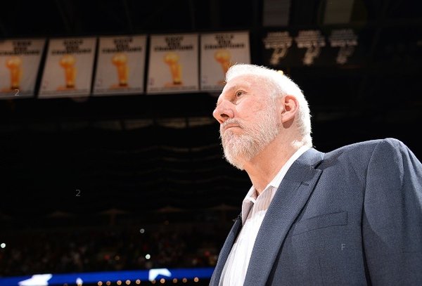 150209215152-gregg-popovich-iso-championship-banners-121214.home-t3.jpg