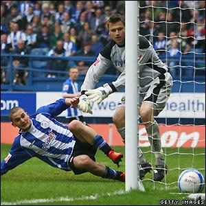 Ben Sahar gives the hosts a precious lead before further goals from Burton and Leon Clarke secure their Championship status.jpg